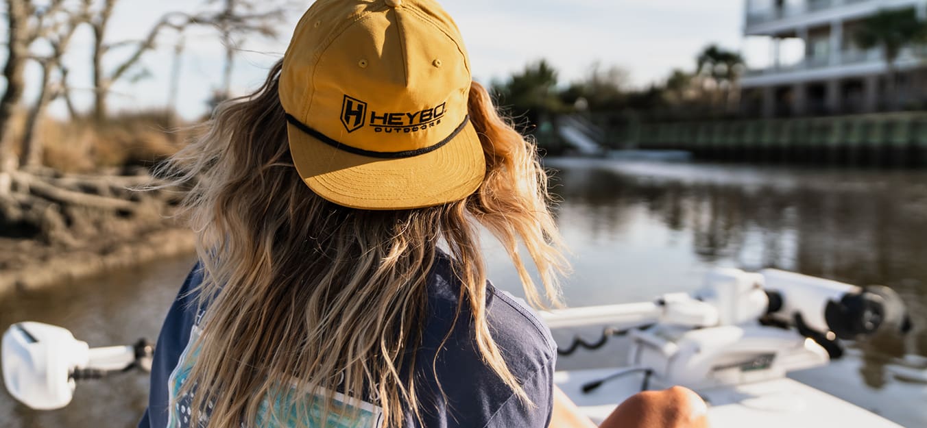 Closeup of woman wearing Heybo cap.