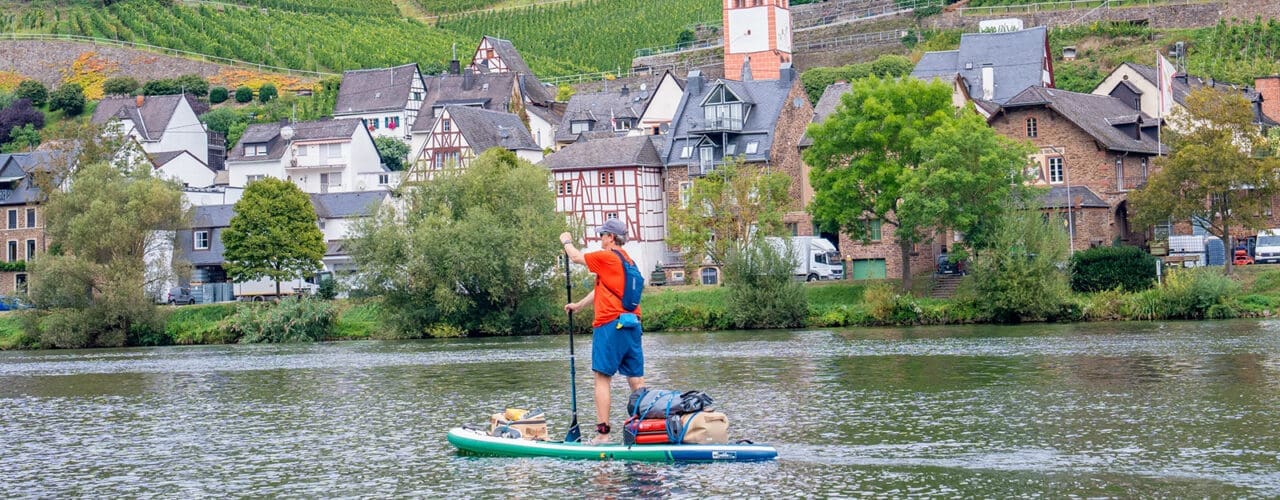 Man paddle boarding in Germany